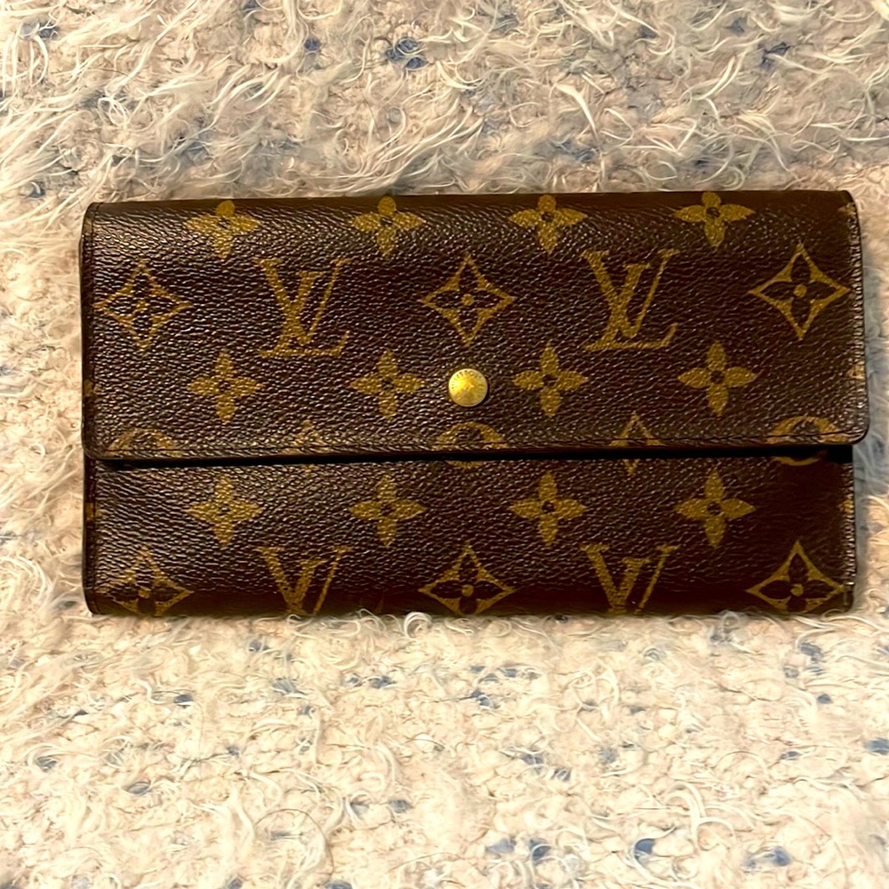 Louis Vuitton Victorine Wallet is slightly used. In great shape. Looks new.